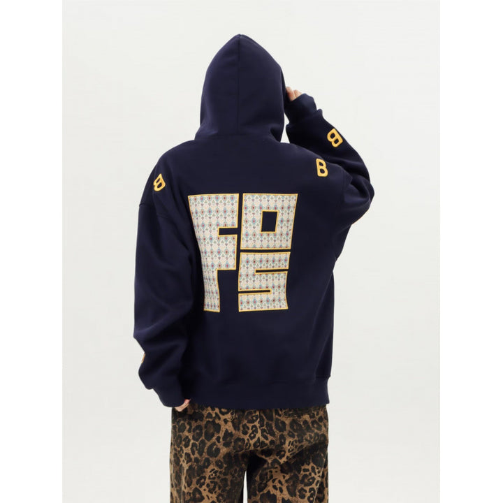 Unisex Oversized Kapuzenpullover mit großflächigem Intarsien‑Blockprint und geripptem Saum Drune