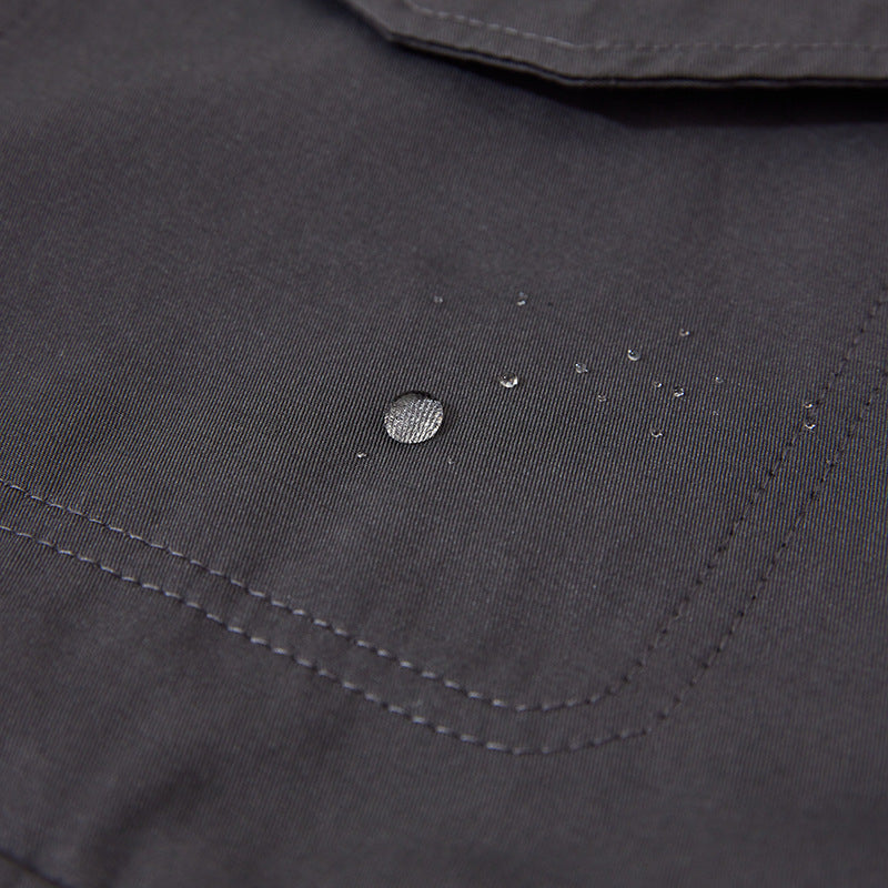 Unisex Boxy-Überjacke mit doppelreihiger Knopfleiste, großen Utility-Pattentaschen und kurzem Boxy-Schnitt Drune