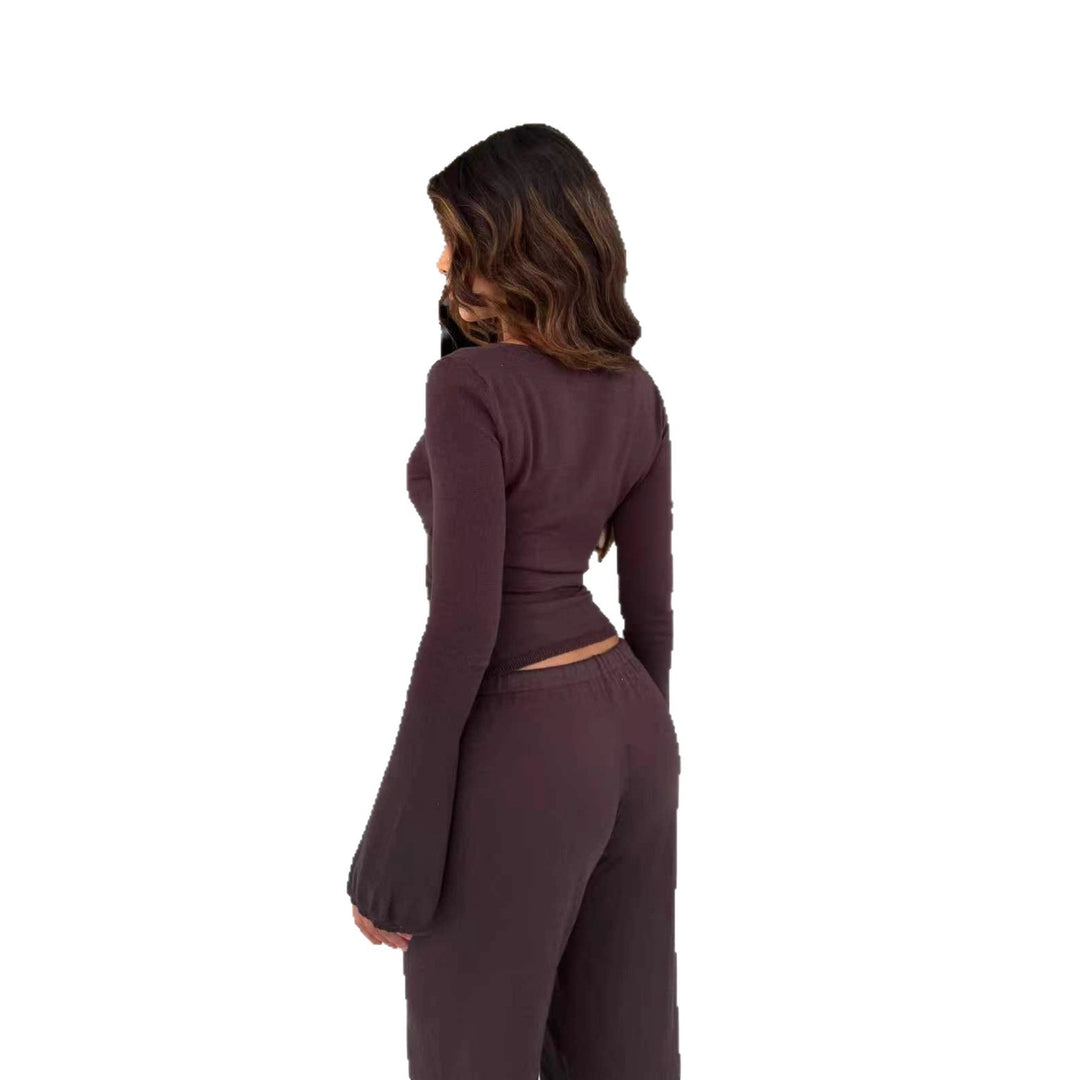 Damen nan Strick-Wickeloberteil mit Bindegürtel und Trompetenärmeln sowie taillenhoher weitgeschnittener Strickhose Drune