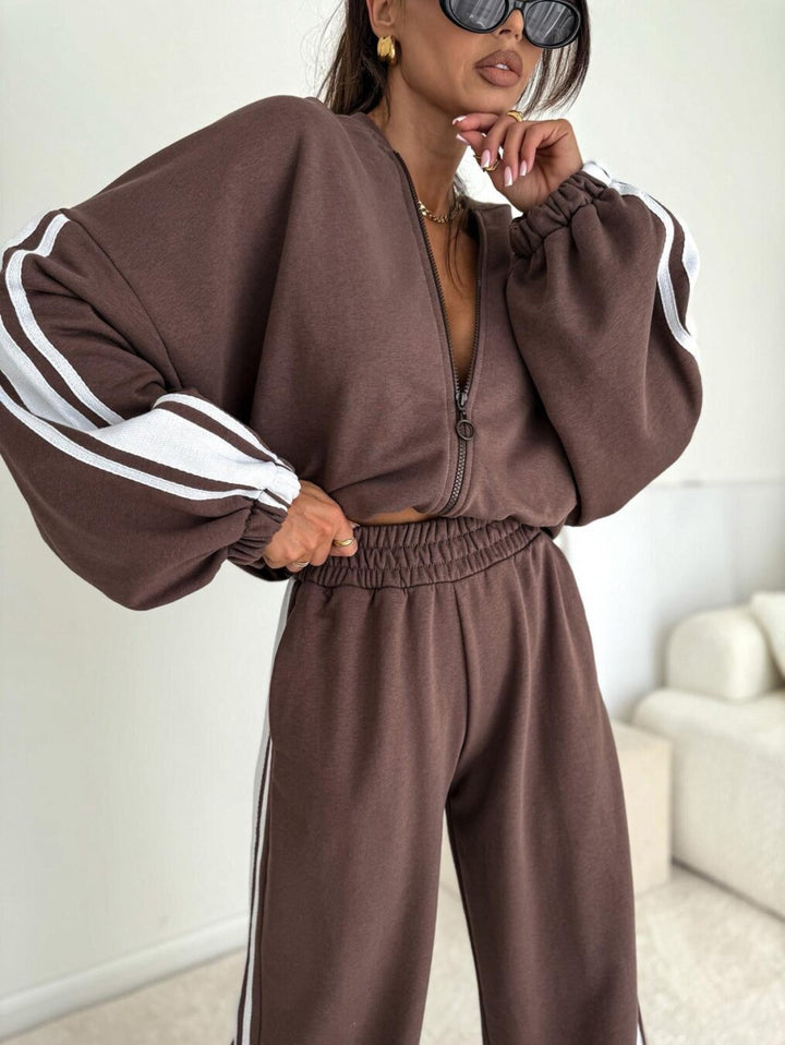 Damen cropped Zip-Hoodie mit voluminösen Ballonärmeln und High-Waist Relaxhose im sportlichen Seitenstreifen-Design Drune
