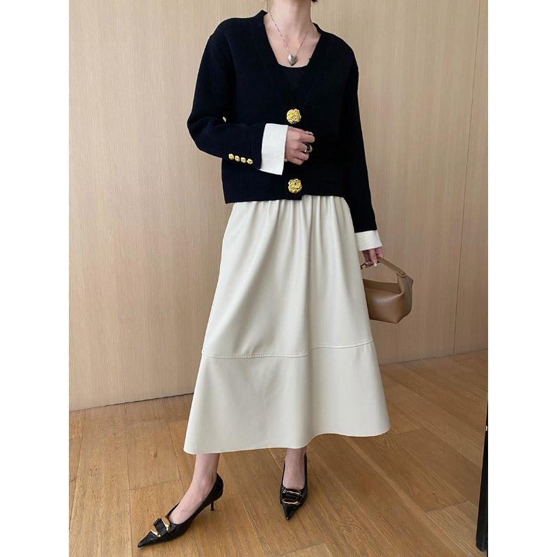 Damen eleganter Cardigan mit Knopfdetails und fließendem Maxirock Drune