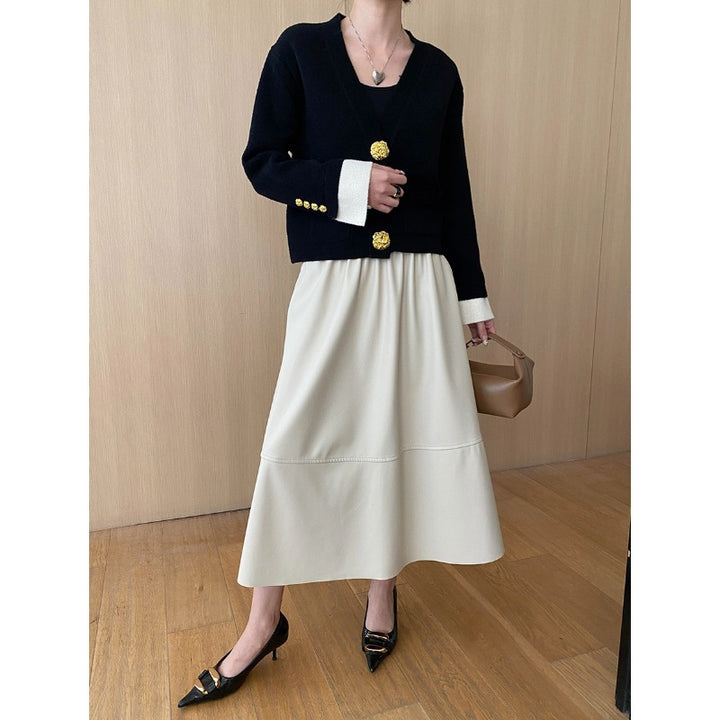 Damen eleganter Cardigan mit Knopfdetails und fließendem Maxirock Drune