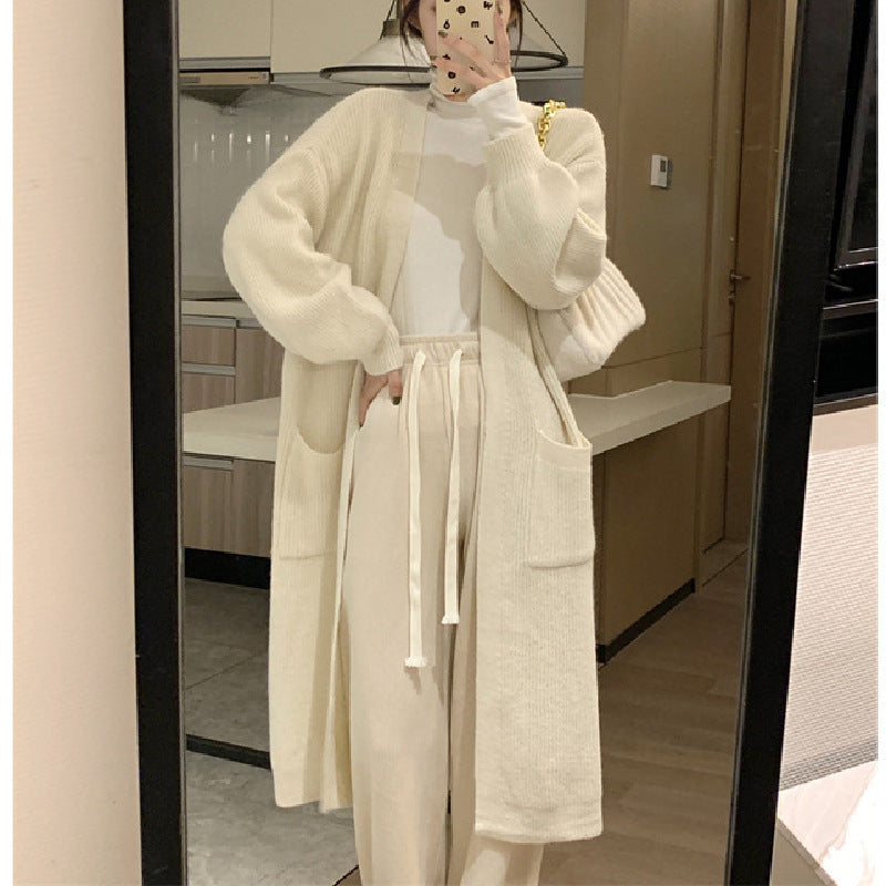 Damen Langer Strickcardigan mit praktischen Taschen und eleganter Silhouette Drune