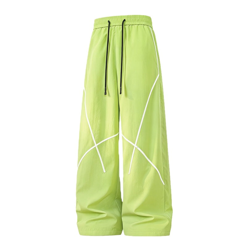 Herren Weite Funktions-Nylonhose mit Kordelbund, reflektierenden Nahtdetails & lässiger Baggy‑Silhouette Drune