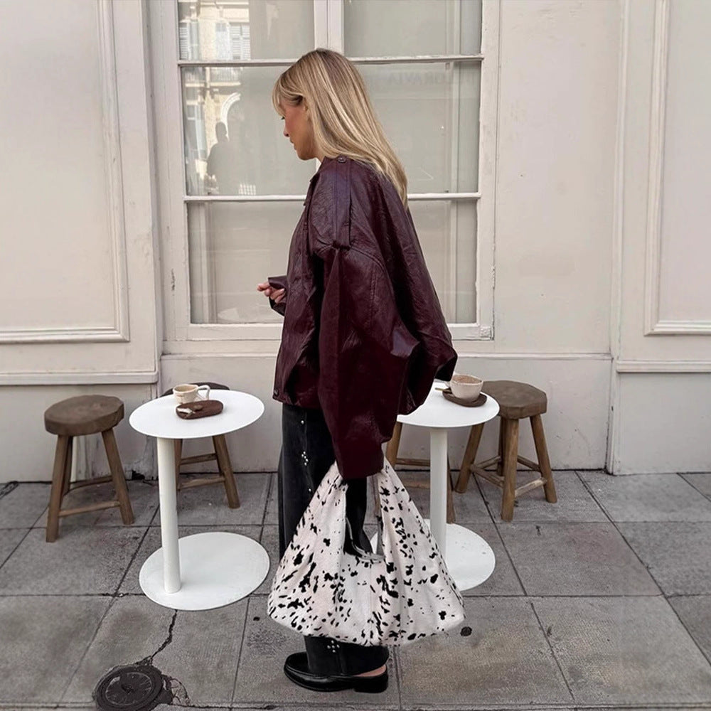Damen Kurzblouson in glänzender Lackoptik mit Boxy‑Silhouette und überschnittenen Schultern Drune