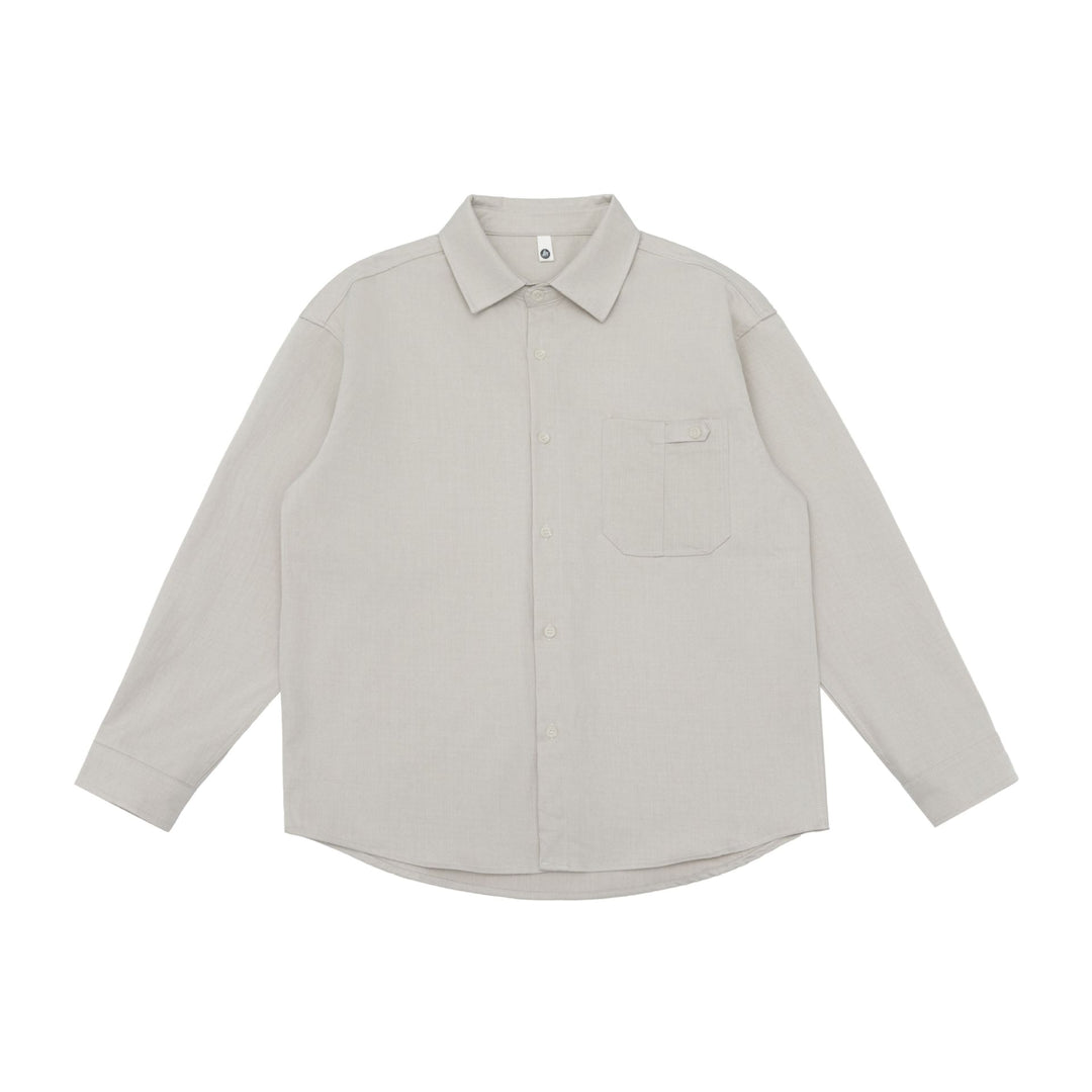 Unisex Oversize Hemdjacke im minimalistischen Workwear Stil mit gerundetem Saum und Brustpattentasche Drune