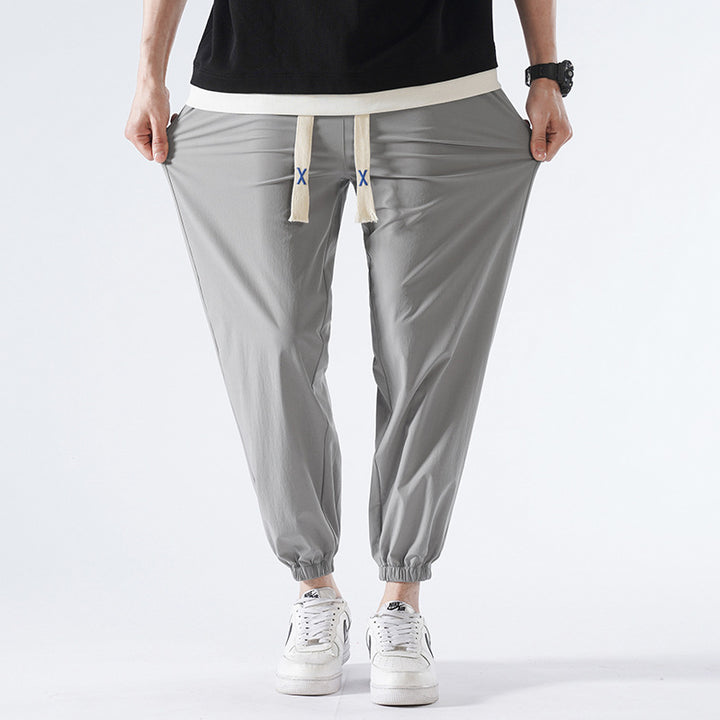 Herren Leichte Relax-Fit-Loungehose aus atmungsaktivem Jersey mit elastischem Tunnelbund, breitem Kordelzug & geripptem Beinabschluss Drune