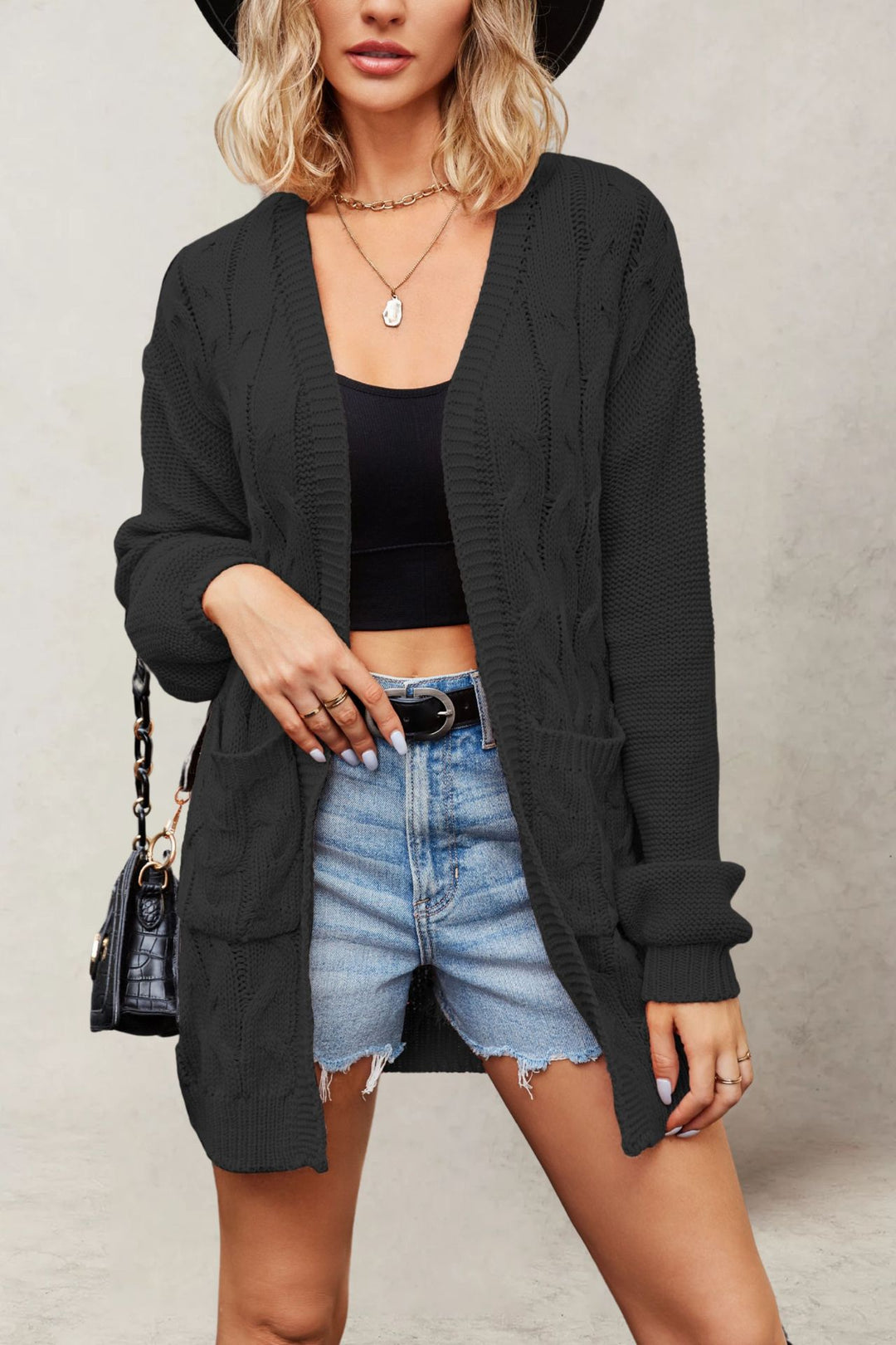 Damen Komfortable Strickjacke mit Taschen und Kabelmuster Drune