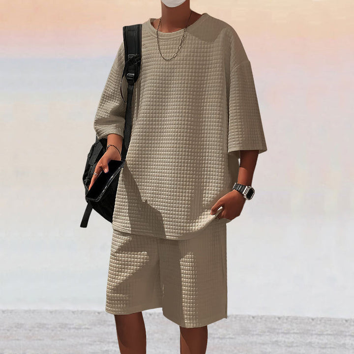 Herren nan quadratstruktur Freizeitset mit oversized Rundhalsshirt und knielangen Relax-Shorts Drune