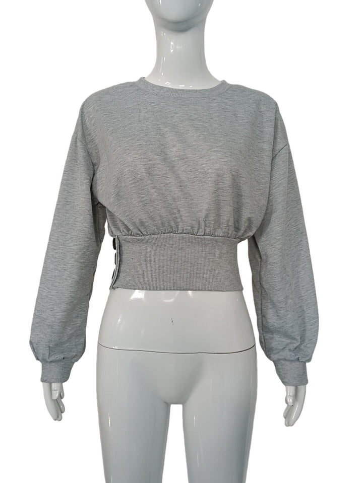 Damen Kurz geschnittenes Sweatshirt mit breitem Rippbund und Seitendruckknöpfen Drune