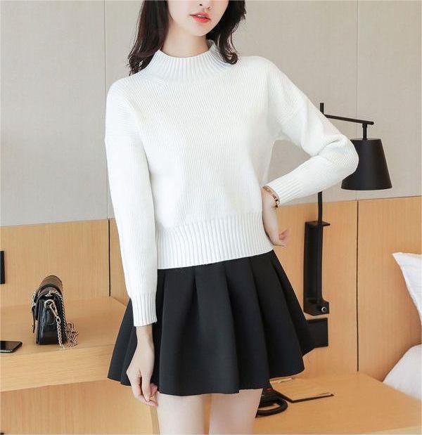 Damen lässiger Strickpullover mit hohem Kragen und feinen Rippdetails Drune