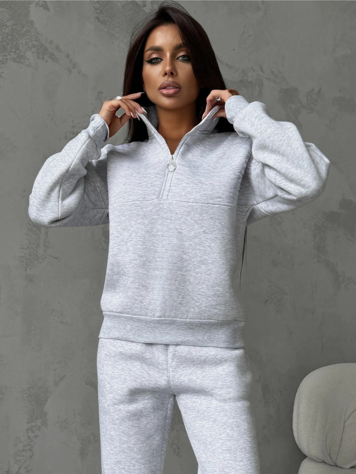 Damen sportlicher Fleece-Jogginganzug mit hohem Kragen und praktischen Reißverschlussdetails Drune