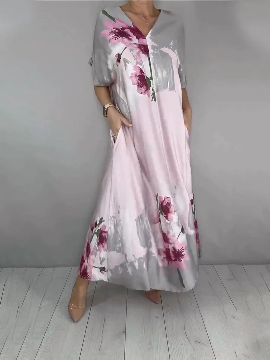 Damen Maxikleid mit weitem Fall, V-Ausschnitt, Eingrifftaschen und floraler Aquarelloptik Drune
