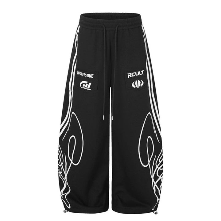 Damen Weite Midilounge‑Sweathose im Palazzo‑Cut mit Tunnelzug, Zip‑Saum und Statement‑Print Drune