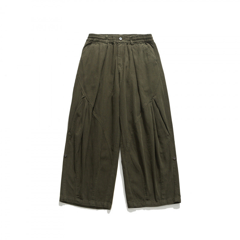 Unisex Weite Plissee-Culottehose mit elastischem Bund, tiefen Eingrifftaschen und legerer 3/4‑Länge Drune