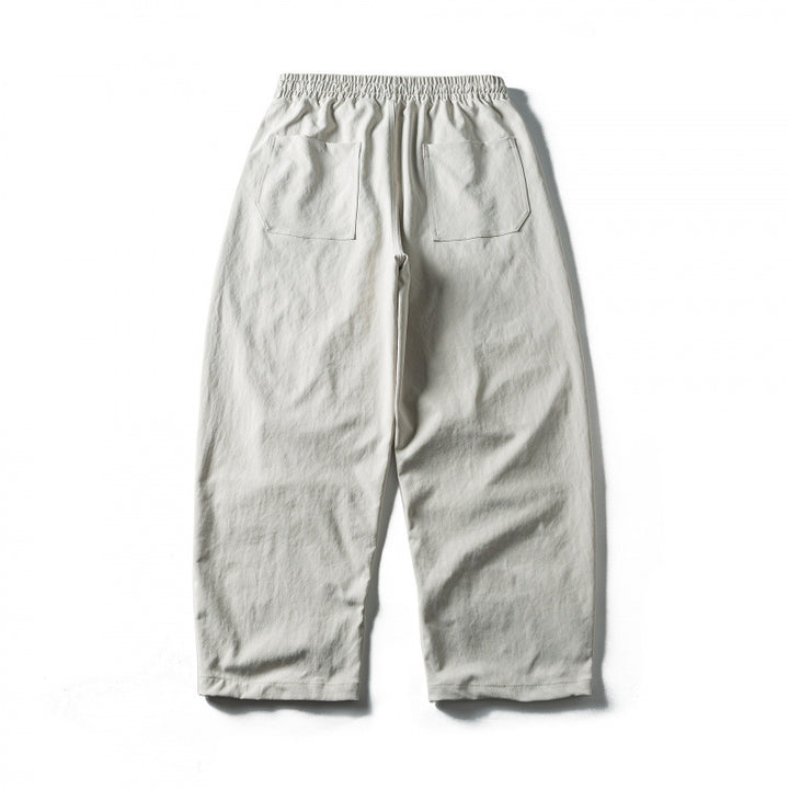 Unisex Weite Cropped-Hose mit Tunnelzug, elastischem Bund und markanten Nahtpaneelen Drune