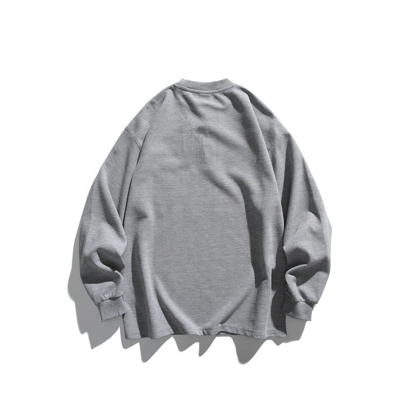 Unisex Oversize Waffel-Henley mit Raglanärmeln und Brusttasche Drune