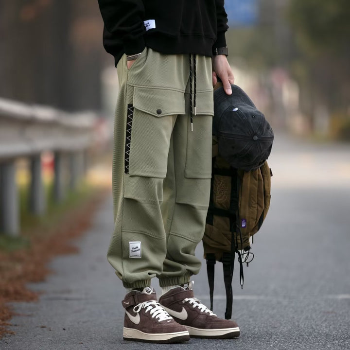 Herren weite Cargo-Jogginghose mit Kordelzug Klapptaschen und elastischen Bündchen Drune