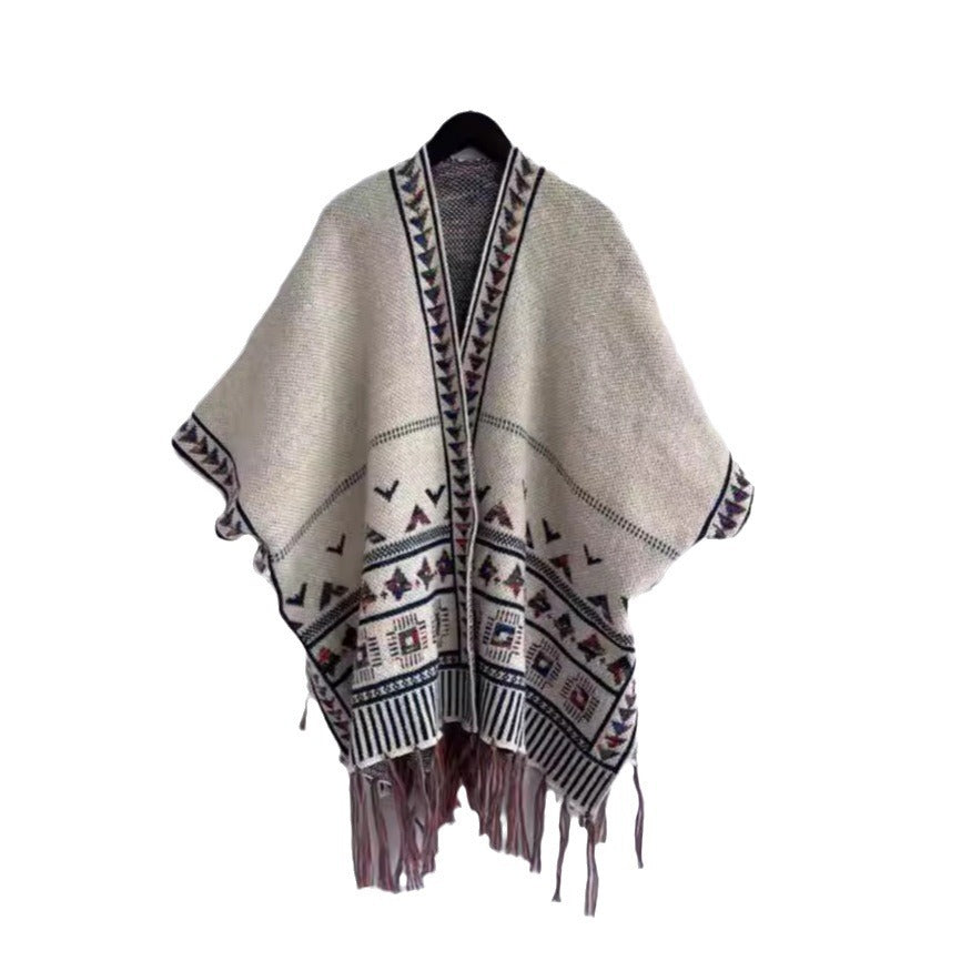 Damen modische Strickponcho mit fransenverzierter Kante und buntem Muster Drune
