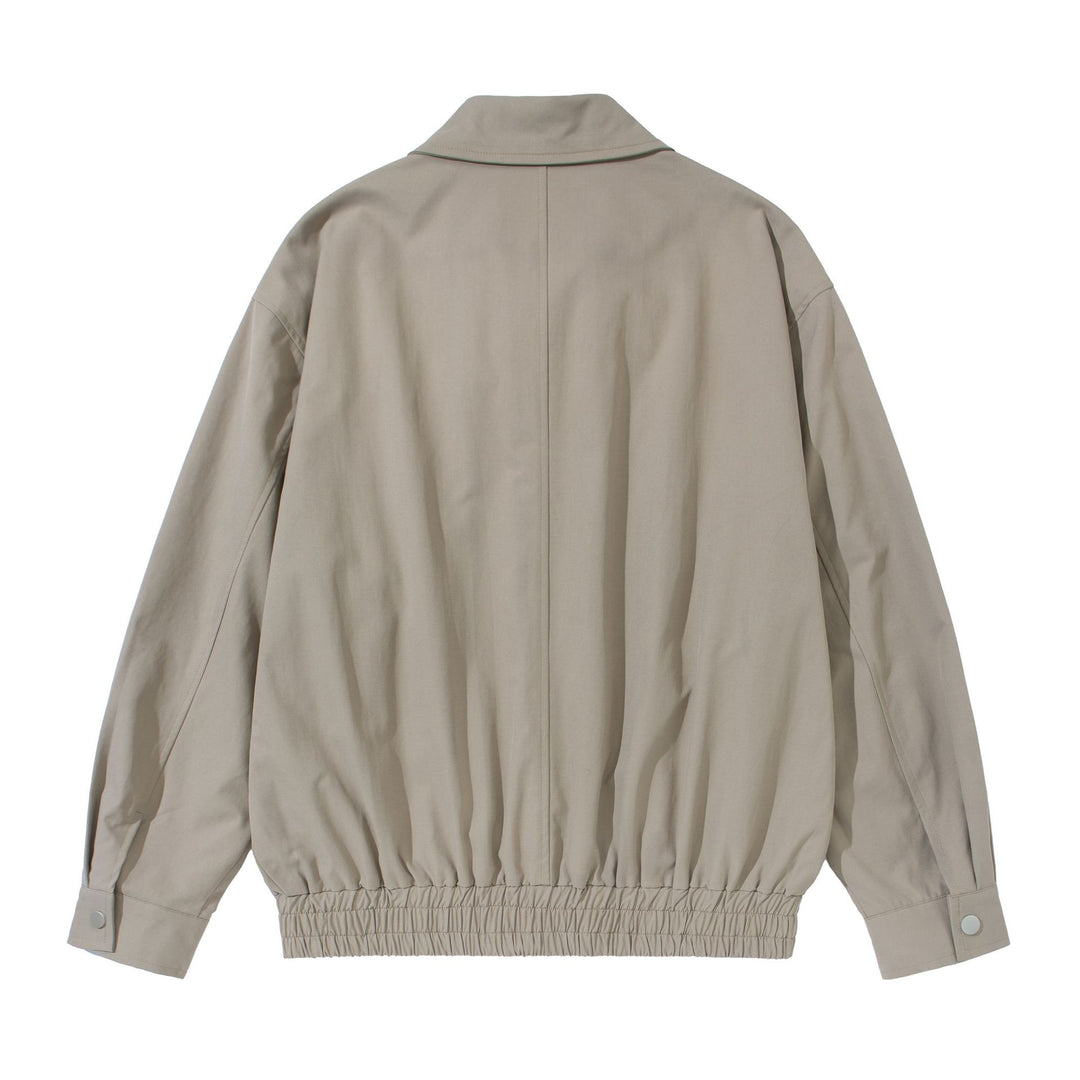 Unisex Kurz geschnittene Boxy-Blousonjacke mit Hemdkragen, verdecktem Reißverschluss und gerafftem Saum Drune
