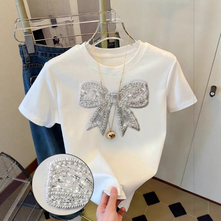 Damen T-Shirt mit glitzerndem Schleifenmotiv und feiner Sticktechnik Drune