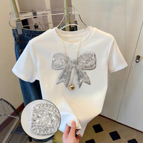 Damen T-Shirt mit glitzerndem Schleifenmotiv und feiner Sticktechnik Drune