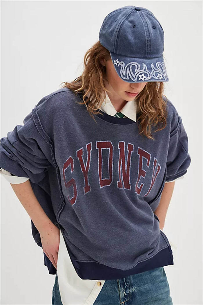 Damen oversized Sweatshirt mit Rüben-Print, ausgefransten Nahtakzenten und Daumenlochärmeln Drune