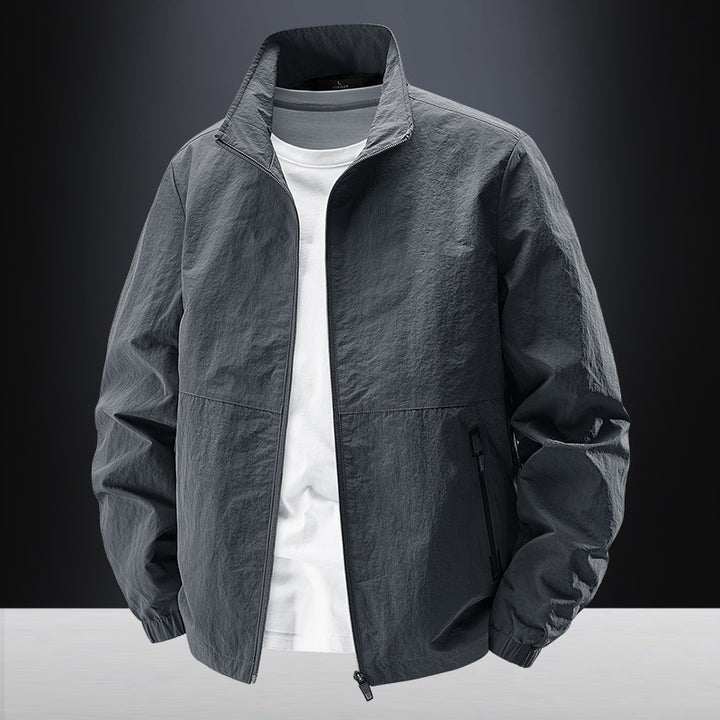Herren Minimalistische Funktionsjacke mit Stehkragen, atmungsaktivem Meshfutter und wasserabweisenden Reißverschlüssen Drune