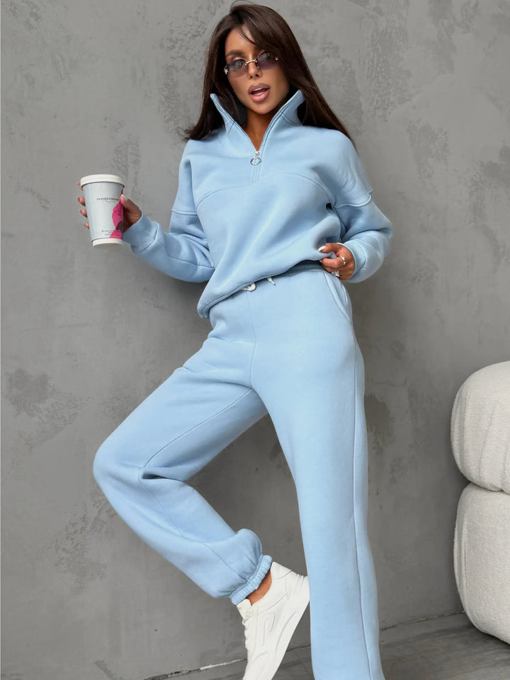 Damen sportlicher Fleece-Jogginganzug mit hohem Kragen und praktischen Reißverschlussdetails Drune