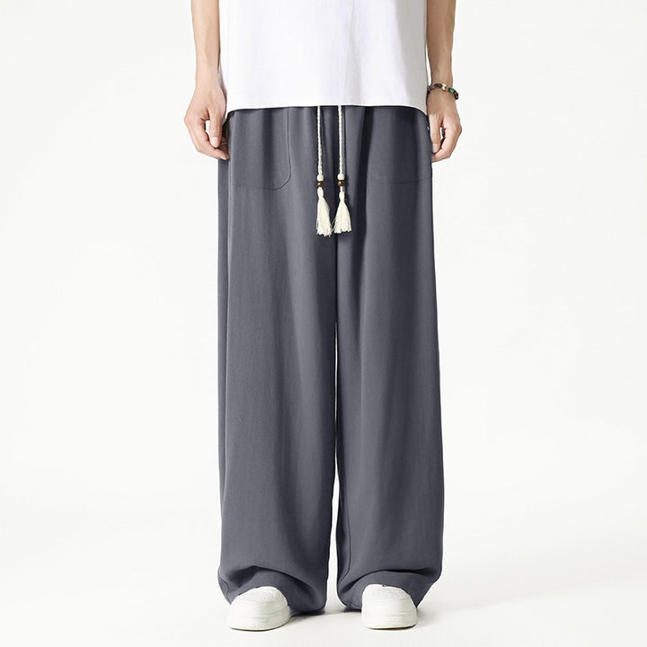 Herren Weit geschnittene Lounge-Hose mit Quasten-Kordel, elastischem Bund und aufgesetzten Taschen Drune