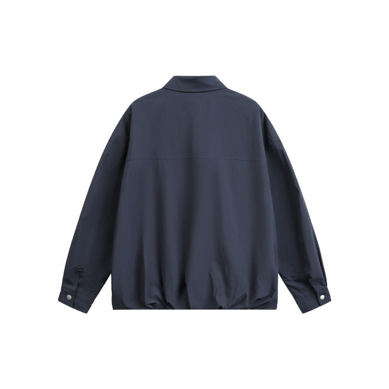 Unisex Boxy-Hemdjacke mit Druckknopfleiste, Hemdkragen und elastischem Saum Drune