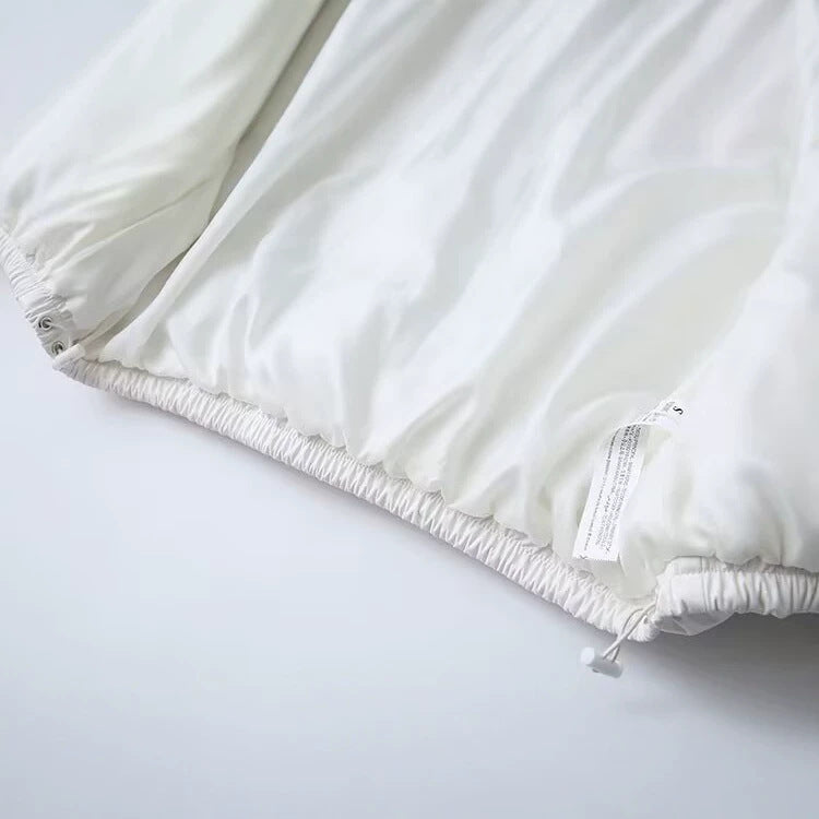 Damen Kurz geschnittene Steppjacke mit hohem Stehkragen, Druckknopfverschluss und elastischem Saum Drune