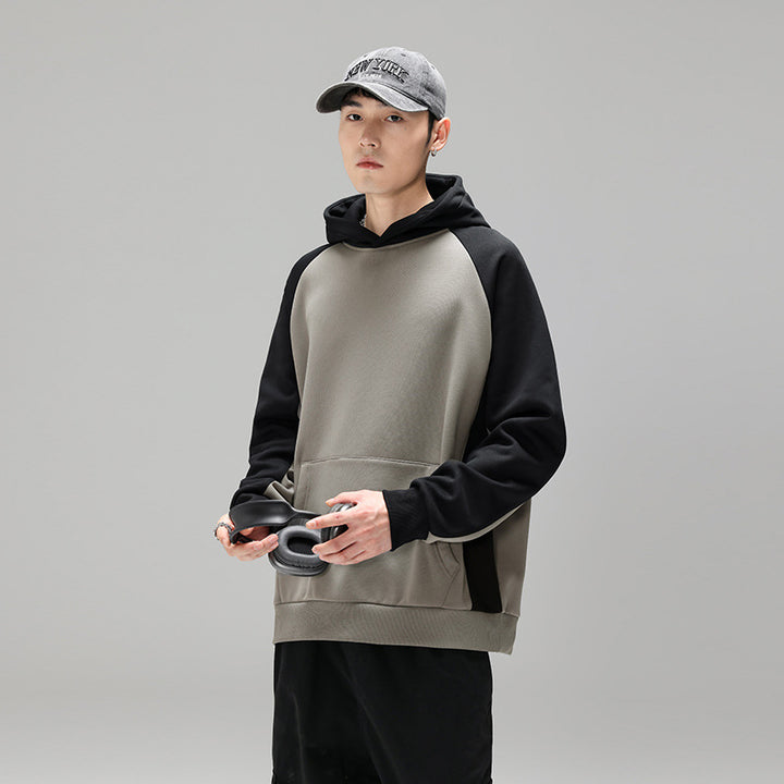Herren Kapuzenpullover im Colourblock-Design mit Raglanärmeln, Kängurutasche und geripptem Saum Drune