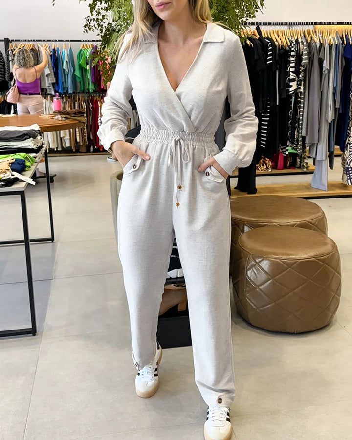 Damen Stilvoller Jumpsuit mit Wickeldesign und Taillengürtel Drune