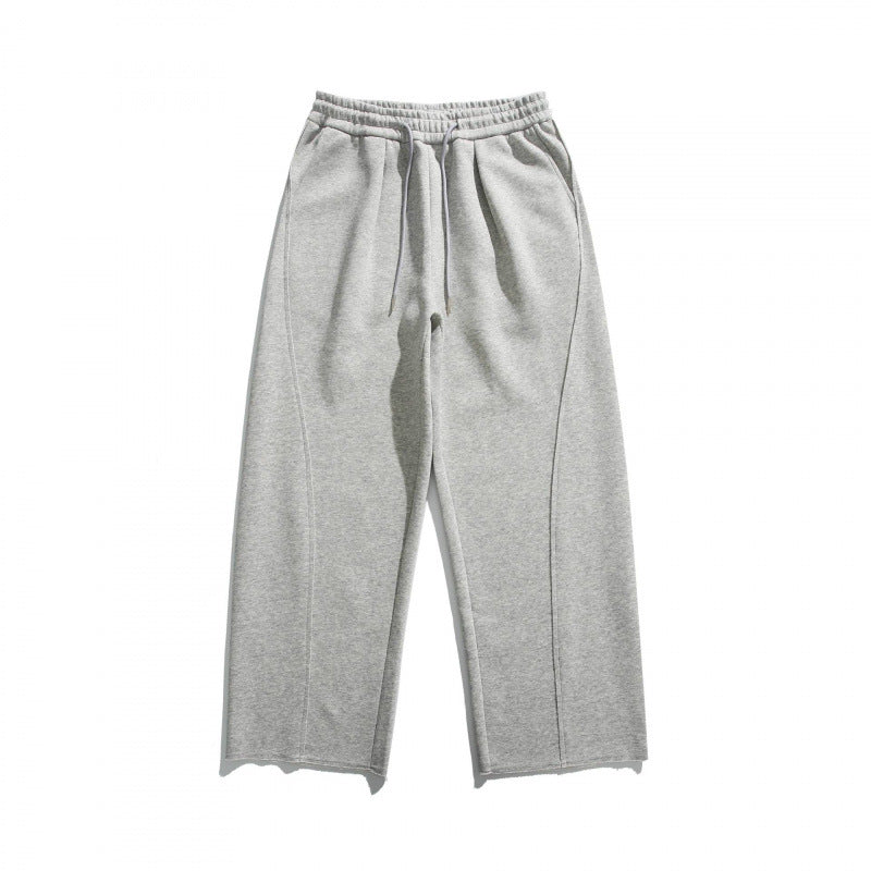 Unisex Weite Baumwoll-Fleece-Jogginghose mit Tunnelzug, Dekorativen Vordernähten und Raw-Saum Drune