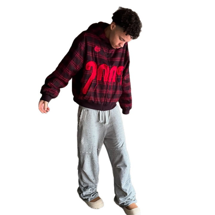 Unisex nan karierter Kapuzenpullover mit fransiger Jahreszahl-Applikation und Rippbündchen Drune