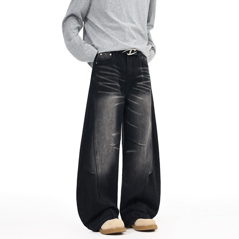 Herren Weitfallende Denim-Palazzo‑Hose mit skulpturalen Nahtpaneelen und bodenlangem Saum Drune