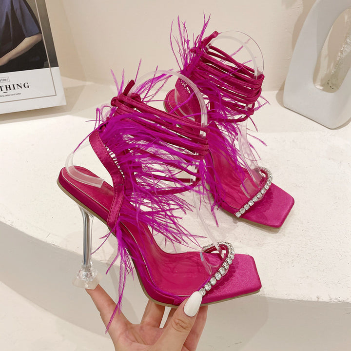 Damen Transparente High Heel Sandalen mit verzierenden Federn und funkelnden Strassdetail Drune