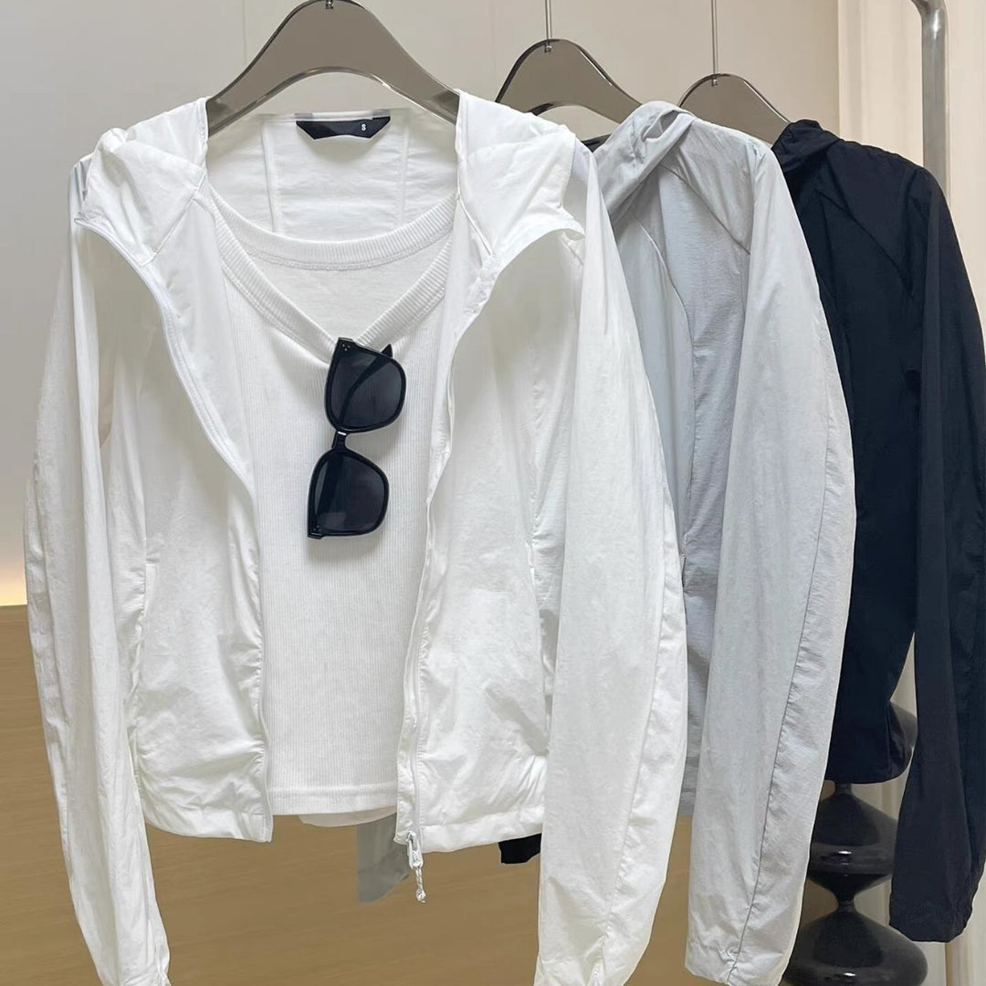 Damen Leichte Kapuzen-Windjacke mit Reißverschluss und verstellbarem Saum Drune