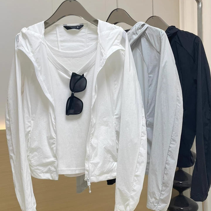 Damen Leichte Kapuzen-Windjacke mit Reißverschluss und verstellbarem Saum Drune