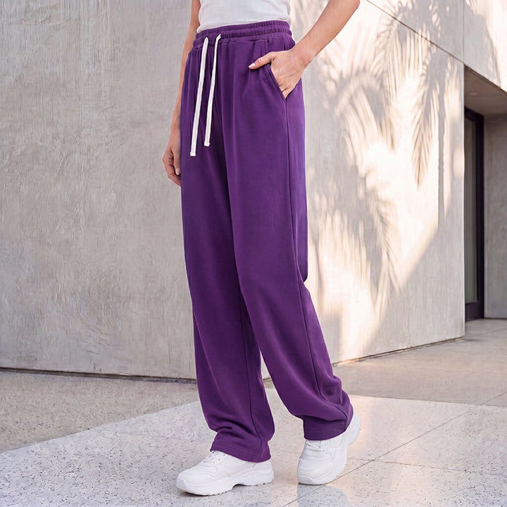 Damen nan weite Loungepalazzo-Hose mit hohem Komfortbund, Kordelzug, seitlichen Eingrifftaschen und dekorativer Seitennaht Drune