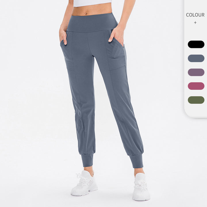 Damen elastische Sporthose mit praktischen Seitentaschen und temperaturregulierendem Material Drune