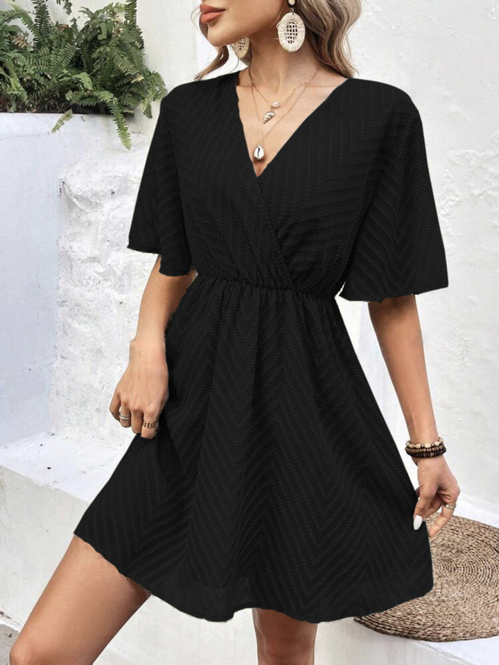 Damen Wickelkleid mit V-Ausschnitt und schwingendem Rock Drune