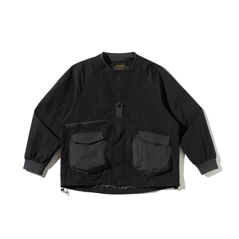 Unisex Leichte Boxy-Fieldjacke ohne Kragen mit Raglanärmeln, aufgesetzten Klappentaschen und Kordelzug Drune