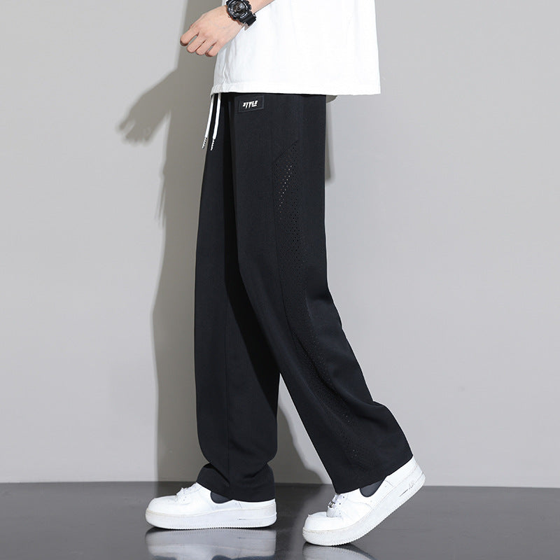 Herren Sportliche Relaxed Fit Jogginghose mit Mesh-Einsätzen
