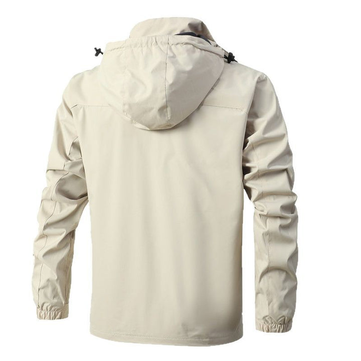 Herren Atmungsaktive wasserdichte Softshelljacke mit nahtversiegelter Membran und verstaubarer Kapuze Drune