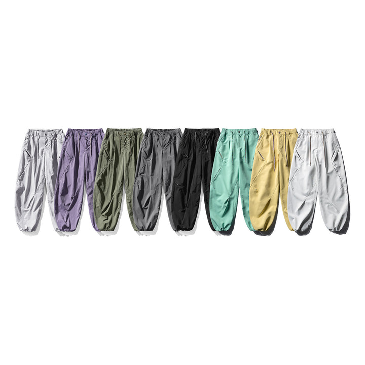 Herren Baggy-Cargohose mit asymmetrischen Eingriffstaschen, Tunnelzugbund und elastischen Knöchelabschlüssen Drune