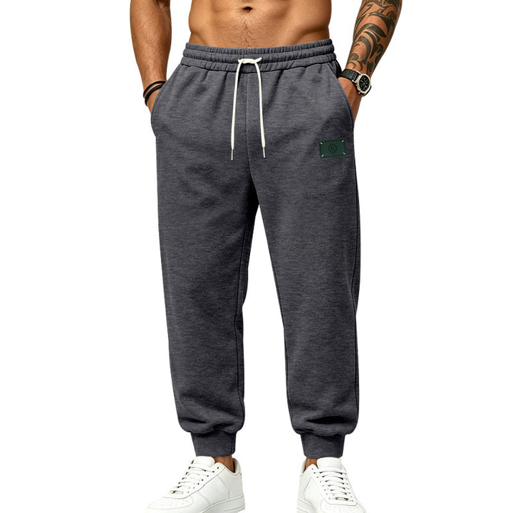 Herren lässig geschnittene Sweat-Jogginghose mit elastischem Bund, Kordelzug und Bündchen Drune