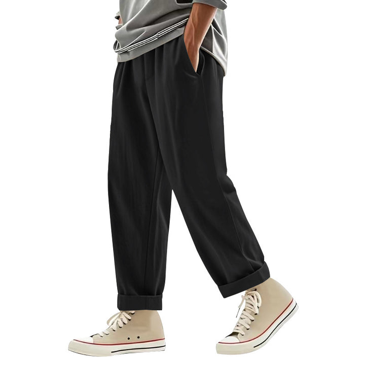 Herren nan weite Bundfalten-Chinohose mit Umschlag, konisch zulaufendem Schnitt und seitlichen Eingrifftaschen Drune