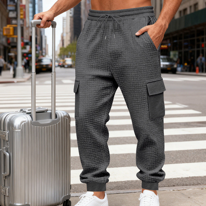 Herren Cargo-Jogginghose mit markanter Waffelstruktur, elastischem Bund und großen Klappentaschen Drune